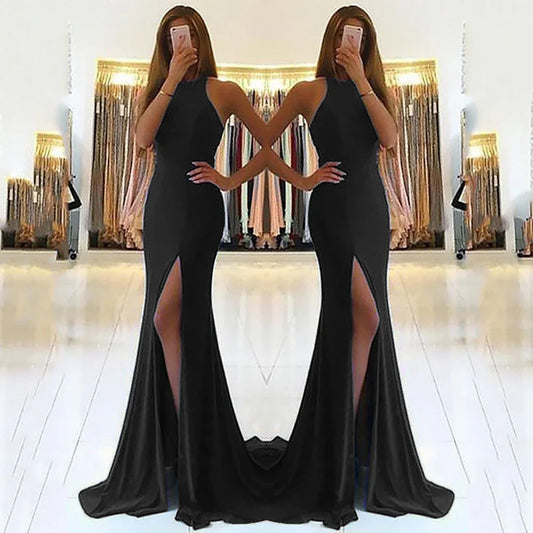 Black satin mermaid evening gown with high slit and halter neckline, perfect for formal events and prom