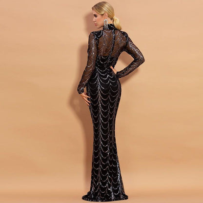 Black sequin mermaid evening gown with long sleeves, sheer back, and high neckline for formal events