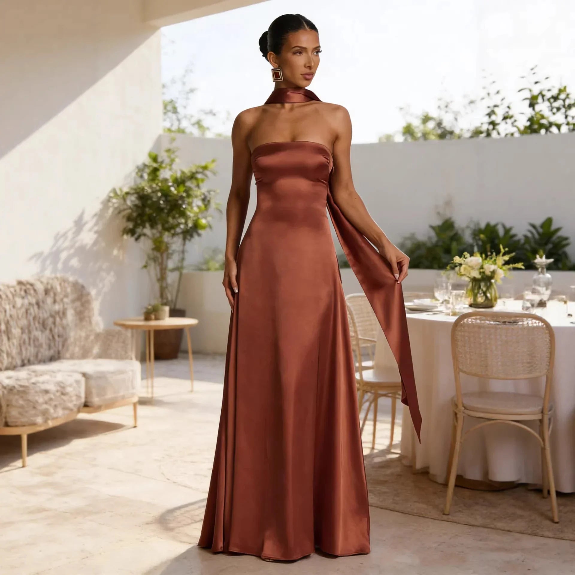 Rust satin strapless evening gown with neck tie detail, perfect for formal events and weddings