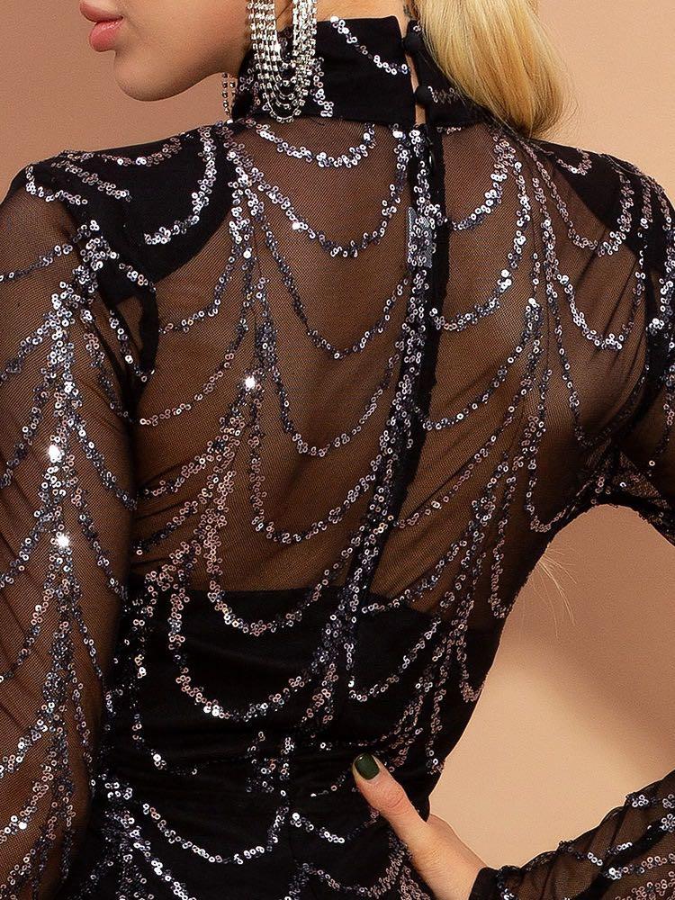 Black sheer long sleeve dress with silver sequin embellishments and high neck, elegant evening wear