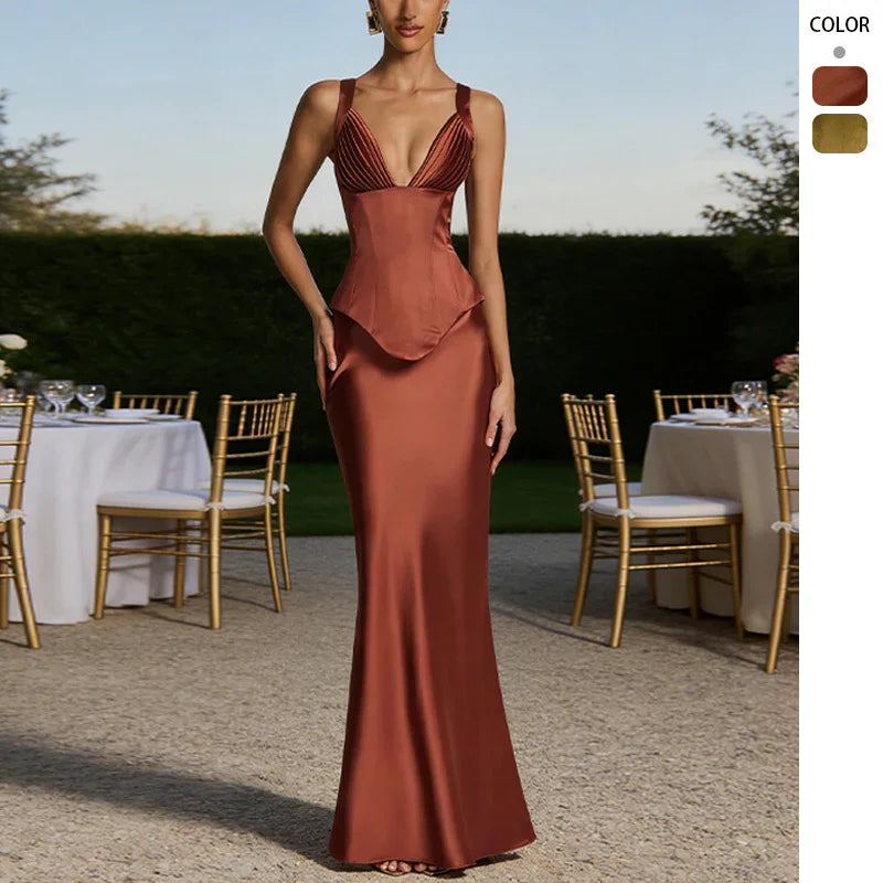 Rust-colored satin evening gown with plunging neckline, peplum waist, and floor-length mermaid skirt for formal events